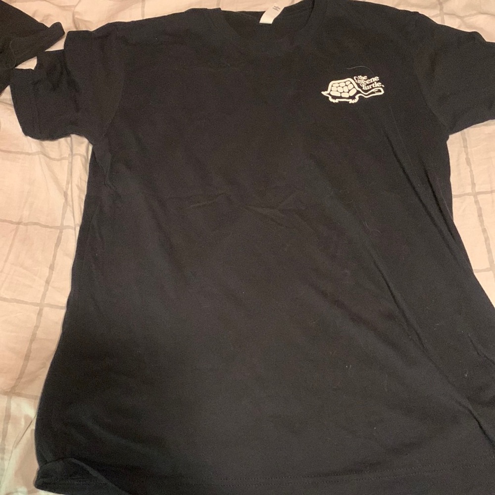 greene turtle employee black tee